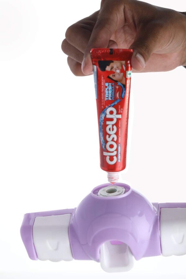 MAGIC I TOOTHPAST DISPENSER