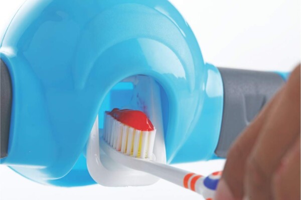 MAGIC I TOOTHPAST DISPENSER